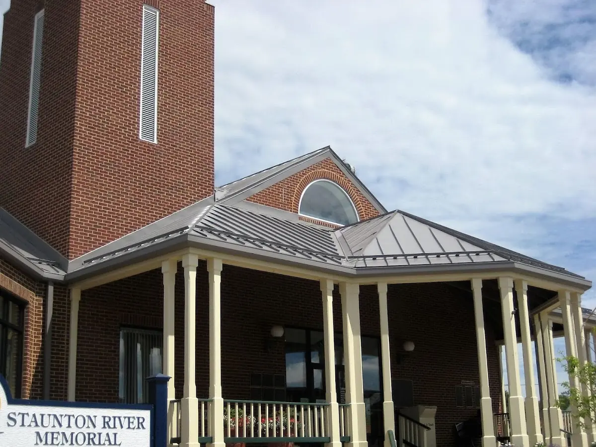 Skilled roofing craftsmen working on a residential roof in Swainsboro